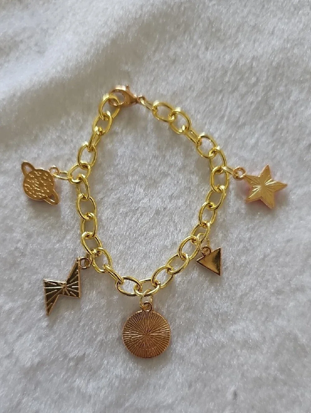 Gold Space Themed Charm Bracelet with Orange and Black Accents